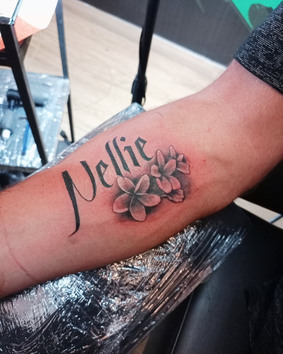 Anahata Ink Tattoo Kuta Bali - Frangipani and Lettering Tattoo