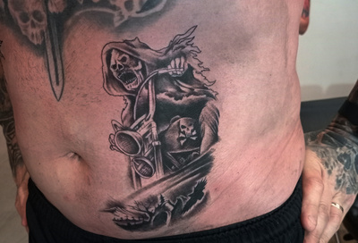 Anahata Ink Tattoo Kuta Bali - Skull Tattoos on Belly